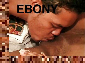 Ebony-skinned chick enjoying a hardcore missionary style fuck on her bed
