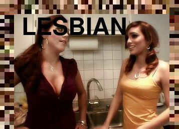 Dazzling redhead lesbian getting her pussy fingered and licked in the kitchen