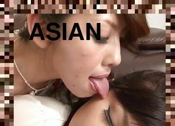 Asian housewife with a cock fucks a beautiful wet pussy