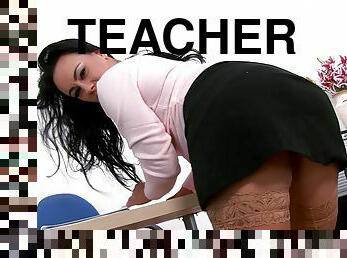 Enchanting teacher with a pussy piercing gets smashed doggy style at work