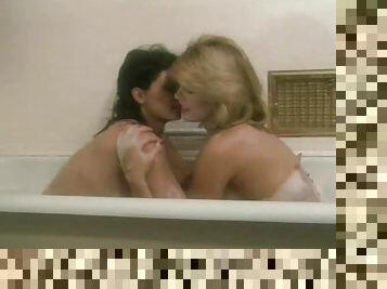 Classic pornstars take a bath and have lesbian sex