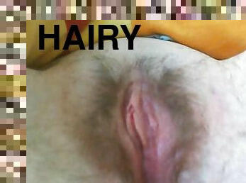 Closeup rubbing of the hairy wife pussy