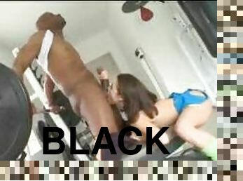 Muscular black man fucks a slut in the gym