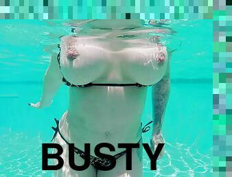 Underwater hardcore pleasure for a busty wife