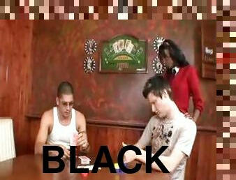 He wins the black girl in a poker game