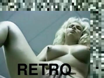 Masturbating blonde in retro office porn video