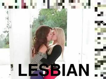 Lesbians in colorful tights kiss passionately