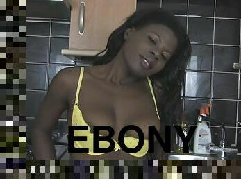 Ebony amateur Kichomi pleasures her pussy on the kitchen floor