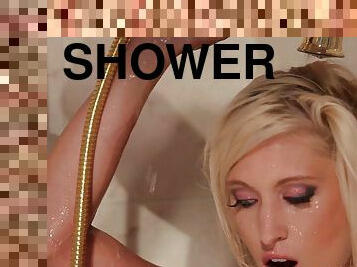 Blonde beauty takes a shower and enjoys her dildo