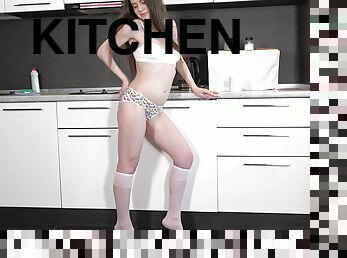 Good looking darling playing alone in the kitchen - Tina Grey