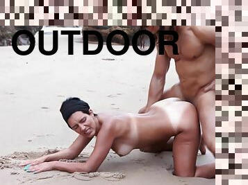 Carol Sousa with shaved pussy being fucked from behind outdoors