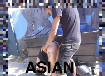 Asian gets big dick facial behind dumspter