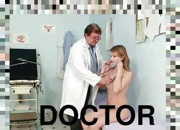 Her pussy is examined by the doctor