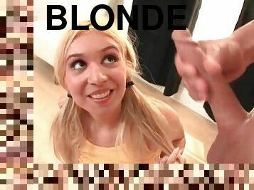 Pigtailed blonde gets her face coverd in cum