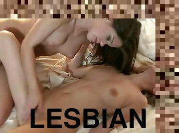 Sensual blonde and brunette lesbians playing naughty
