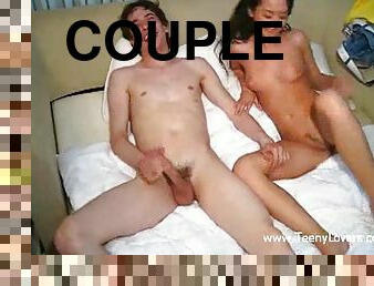 Teen couple foreplay in bed