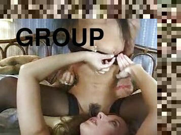 Group scene includes interracial sex