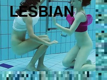 Lesbians Lera and Sima Lastova in the underwater pool
