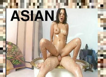amazing asian with big tits rides hard her boyfriend deep in her pussy.