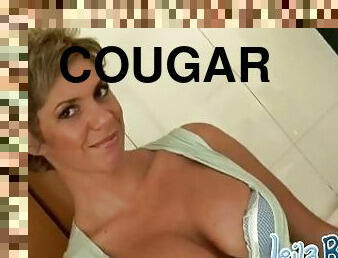Solo topless cougar fondles her curves