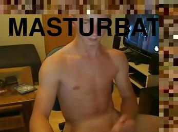 Tanned teen with shaved head jerks off his dick