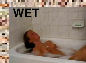 Slender and nubile blonde teen fingering herself in the bathtub