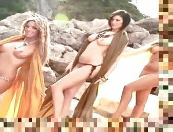 Three hot UK Cyber girls pose for the camera at the rocky beach