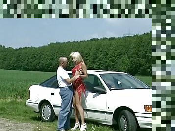 Blonde Nicoletta gets some roadside assistance from a big dick