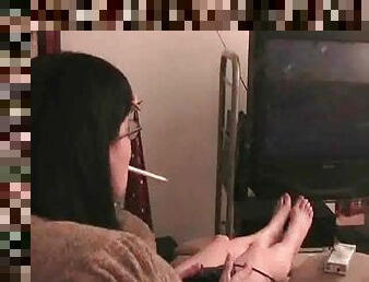 Smoking girl plays video games