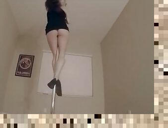 Lelu works the stripper pole in her bedroom
