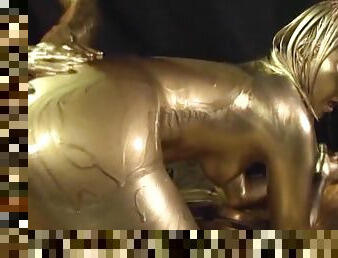 Ai Uehara is a sex slave covered in golden paint before a fuck