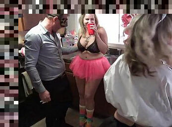 Swinger MILF working two cocks at swing party