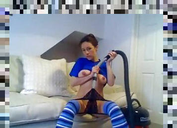 Girl using vacuum cleaner on pussy