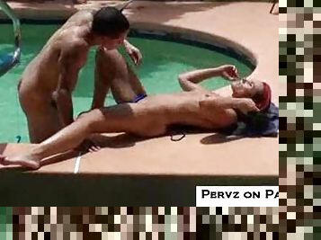 Lusty couple by the pool doing oral