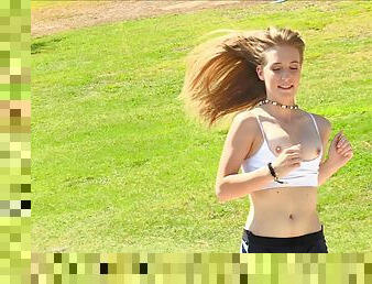 Sporty blonde babe Dakota exposes her pussy in public while jogging