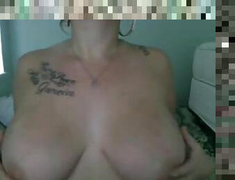 Sexy blonde babe with huge boobs on webcam teasing and having fun