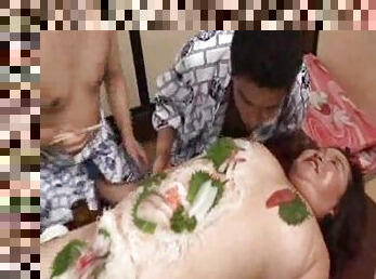 Guys eating food off a fat Japanese chick