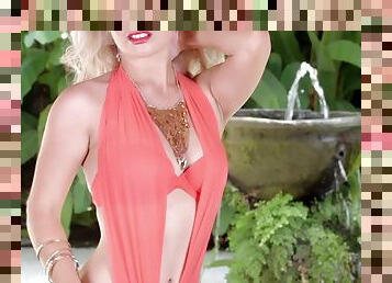 Blonde stunner in a hot bikini enjoys an outdoors solo shoot