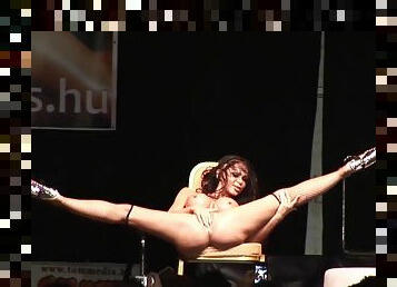 flexible busty babe on stage