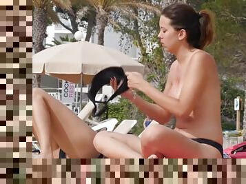 Voyeur beach visit for a topless compilation