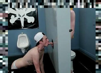 Twink in a baseball cap swallows gloryhole cock