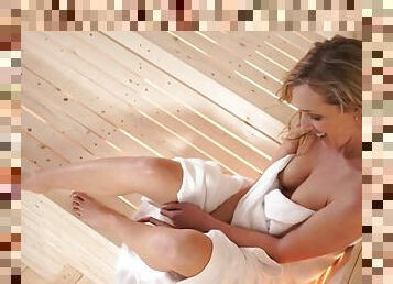 British cutie teasing her tits in the sauna