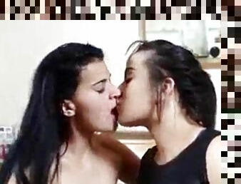 TWO LESBIANS LICKING AND KISSING EACH OTHER