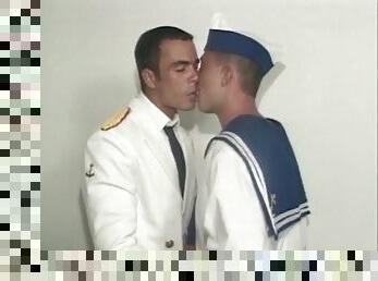 Latin guys in uniform kiss and suck cock