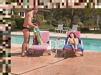 Redhead girl Zoe Voss lets a friend fuck her by the pool