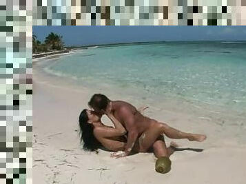 Hot couple is banging on the beach in white sand