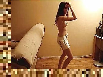 Naughty brunette chick striptease on camera