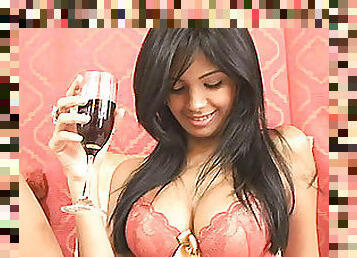 Gorgeous Busty Brunette Drinking Wine with Her Red Bra On