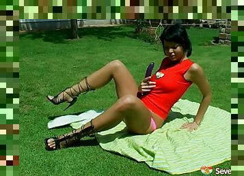 Dark haired teen in high heels enjoys masturbating nicely in this outdoors scene