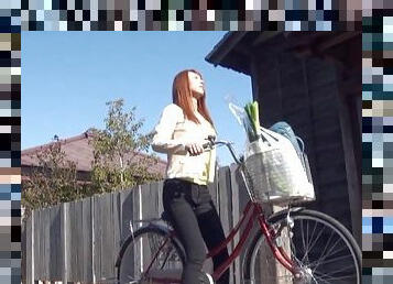 Cardigan cutie on a bike welcomes cock into her Japanese pussy